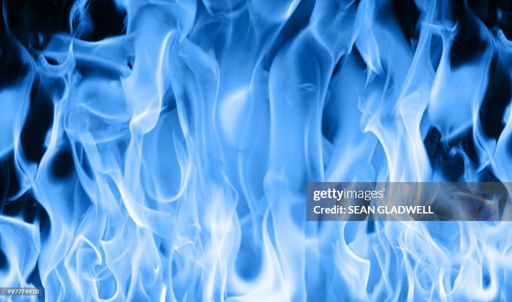 Blue Fire Background High-Res Stock Photo - Getty Images