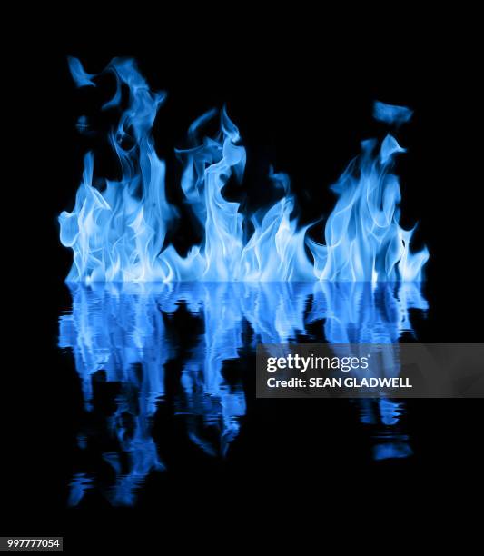 blue flames on water - 炎 ストックフォトと画像