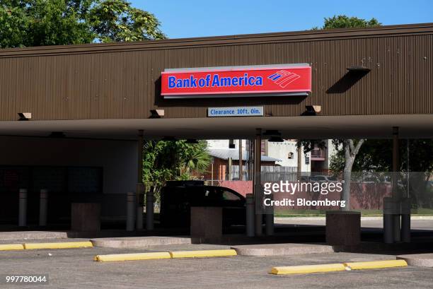 Car sits at the drive-thru teller of a Bank of America Corp. Branch in San Antonio, Texas, U.S., on Thursday, July 12, 2018. Bank of America Corp. Is...
