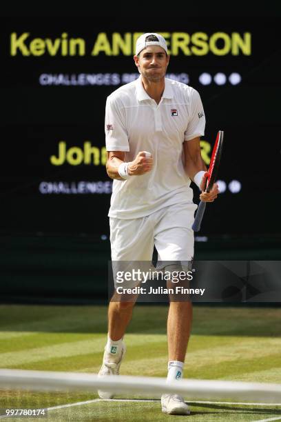 John Isner of The United States celebrates a point against Kevin Anderson of South Africa during their Men's Singles semi-final match on day eleven...