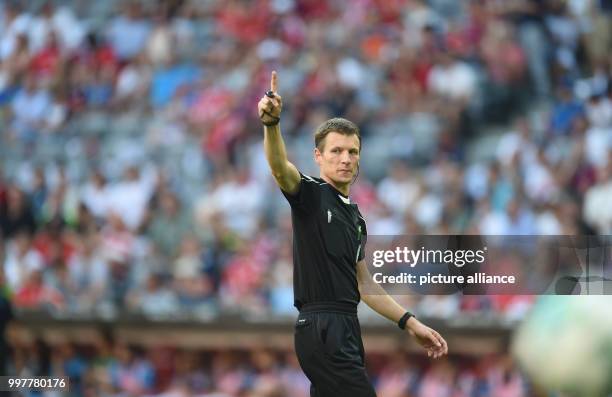 Referee Benjamin Cortus in action during the Audi Cup soccer match between SSC Naples and Bayern Munich in the Allianz Arena in Munich, Germany, 2...