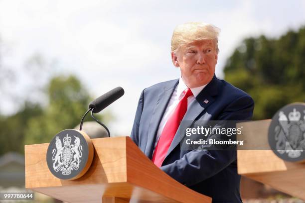 President Donald Trump, left, looks to Theresa May, U.K. Prime minister, during a joint news conference at Chequers in Aylesbury, U.K., on Friday,...
