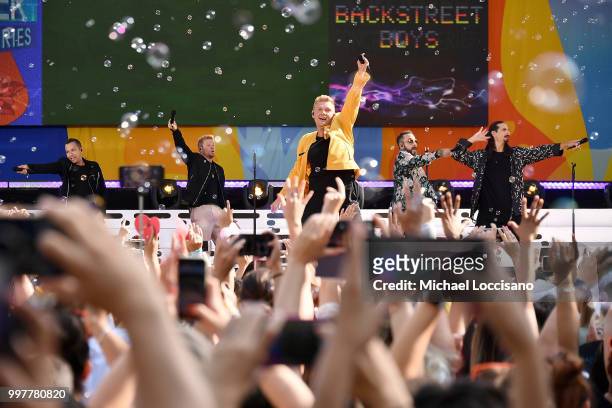 Howie D., Brian Littrell, Nick Carter, AJ McLean and Kevin Richardson of the Backstreet Boys perform on ABC's "Good Morning America" at SummerStage...