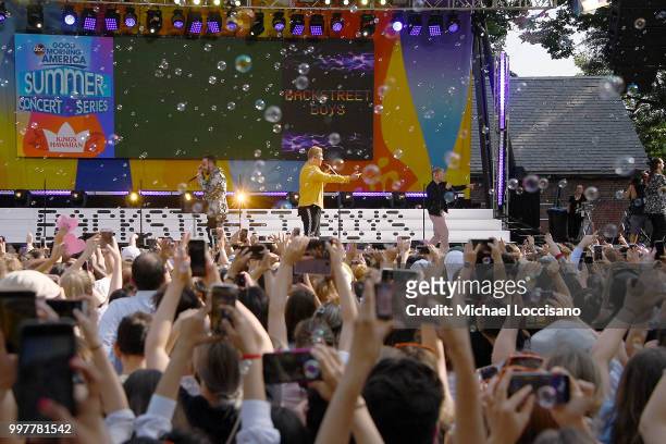 McLean, Nick Carter and Brian Littrell of the Backstreet Boys perform on ABC's "Good Morning America" at SummerStage at Rumsey Playfield, Central...