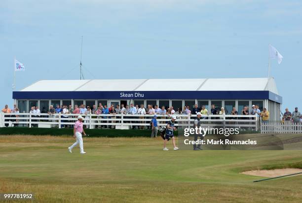 Stephen Gallacher of Scotland and Lee Westwood of England walk to the 17th green during the second day of the Aberdeen Standard Investments Scottish...