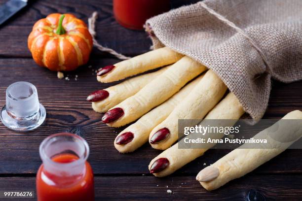 cookies witch's fingers for halloween celebration - covered food with wine stock pictures, royalty-free photos & images