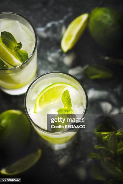 Mojito cocktail with lime and mint in glass on a stone table. Photo by: Anjelika Gretskaia/REDA&CO/Universal Images Group via Getty Images