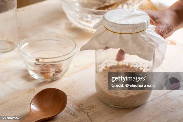 sourdough preparation - massa fotografías e imágenes de stock