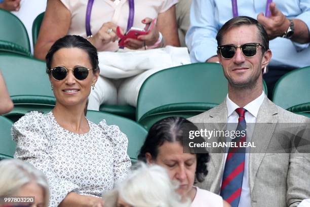 Pippa and James Matthews arrive on centre court to watch South Africa's Kevin Anderson play US player John Isner in their men's singles semi-final...