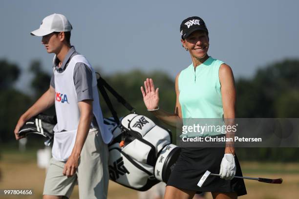 Suzy Whaley walks with her caddie Brett Glennon on the 16th hole during the second round of the U.S. Senior Women's Open at Chicago Golf Club on July...