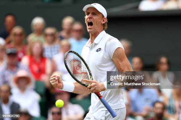 Kevin Anderson of South Africa celebrates winning a break point against John Isner of The United States during their Men's Singles semi-final match...