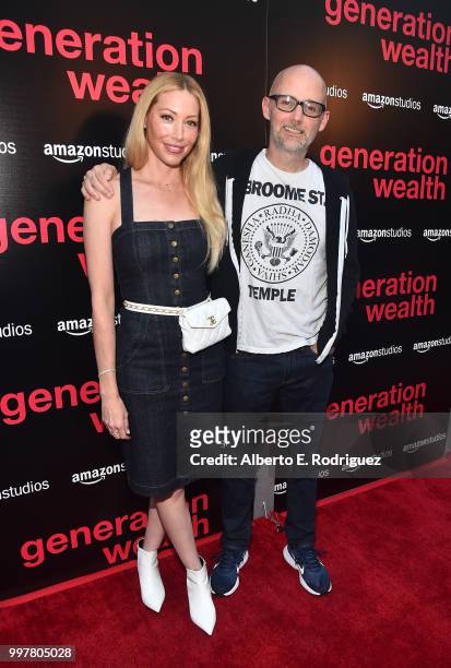 Julie Mintz and Moby attend the premiere of Amazon Studios' "Generation Wealth" at ArcLight Hollywood on July 12, 2018 in Hollywood, California.