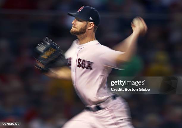 Boston Red Sox starting pitcher Chris Sale fires a pitch. The Boston Red Sox host the Texas Rangers in a regular season MLB baseball game at Fenway...