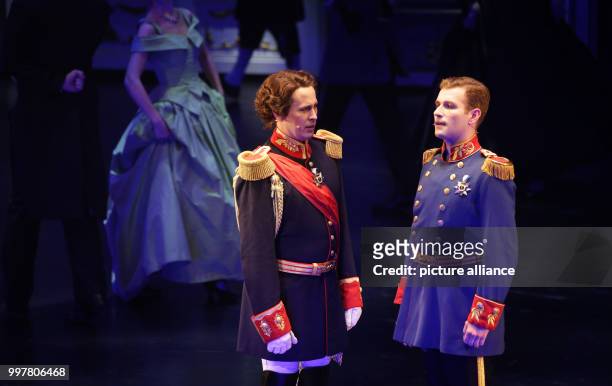 Matthias Stockinger as King Ludwig II and Julian Wejwar as Prince Otto on stage during the premiere of the musical 'Ludwig II' in Fuessen, Germany, 3...