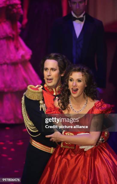 Matthias Stockinger as King Ludwig II and Anna Hofbauer as Empress Elisabeth on stage during the premiere of the musical 'Ludwig II' in Fuessen,...