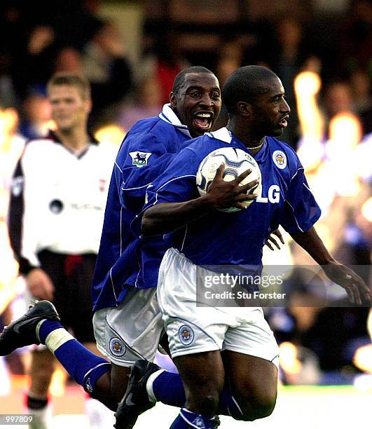 Andrew Impey congratulates Dean Sturridge after the Leicester striker equalised in the last minute during the FA Barclaycard Premiership game between...