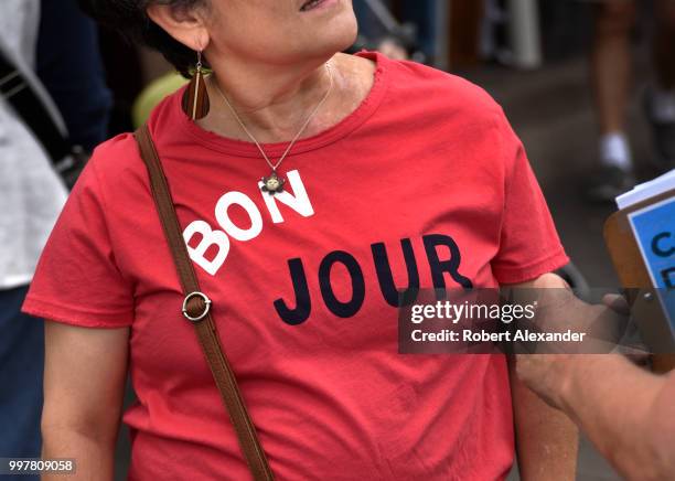 Woman wears a 'Bon Jour' T-shirt at a Fourth of July holiday event in Santa Fe, New Mexico.