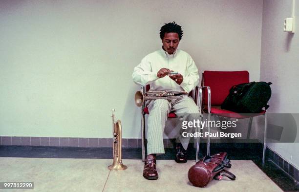 American jazz trumpeter Roy Hargrove preparing in his dressing room at North Sea Jazz Festival, The Hague, Netherlands, 10 July 1998.