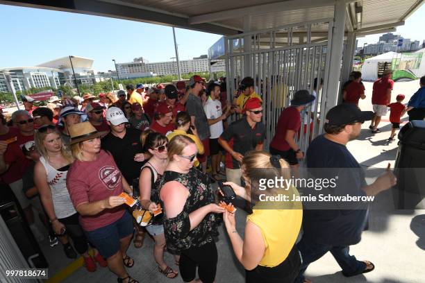 Fans enter the stadium for the championship game between the Oregon State Beavers and the Arkansas Razorbacks during the Division I Men's Baseball...