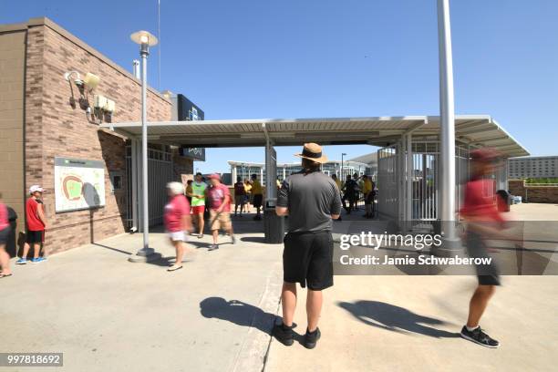 Fans enter the stadium for the championship game between the Oregon State Beavers and the Arkansas Razorbacks during the Division I Men's Baseball...