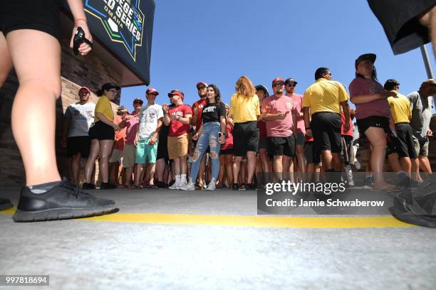 Fans wait to enter the stadium for the championship game between the Oregon State Beavers and the Arkansas Razorbacks during the Division I Men's...