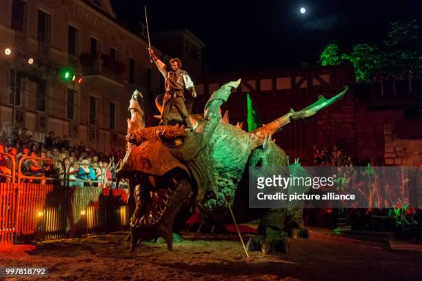 Dpatop - Knight Udo standing on the dragon during the general rehearsal of the folk play "The Dragon Sting" in Furth im Wald, Germany, 03 August...
