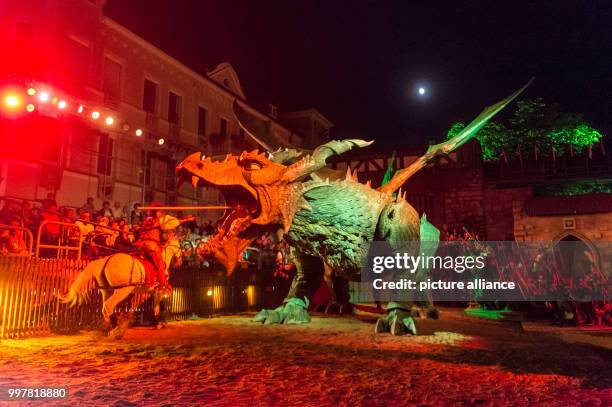 Knight Udo piercing the dragon during the general rehearsal of the folk play "The Dragon Sting" in Furth im Wald, Germany, 03 August 2017. The...