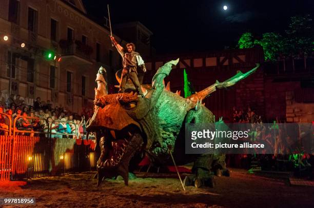 Knight Udo standing on the dragon during the general rehearsal of the folk play "The Dragon Sting" in Furth im Wald, Germany, 03 August 2017. The...