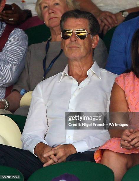 Pierce Brosnan in the stands on day eleven of the Wimbledon Championships at the All England Lawn Tennis and Croquet Club, Wimbledon.
