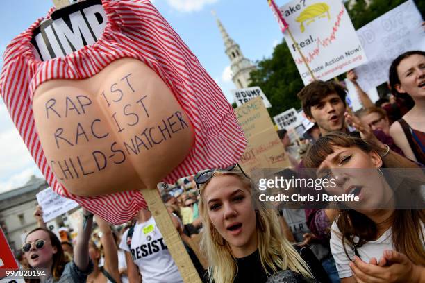 Protesters take part in a demonstration against President Trump's visit to the UK in Trafalgar Square on July 13, 2018 in London, England. Tens of...