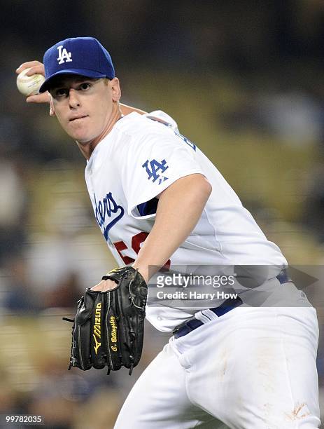 Chad Billingsley of the Los Angeles Dodgers makes a throw to first for an out against the Milwaukee Brewers at Dodger Stadium on May 5, 2010 in Los...
