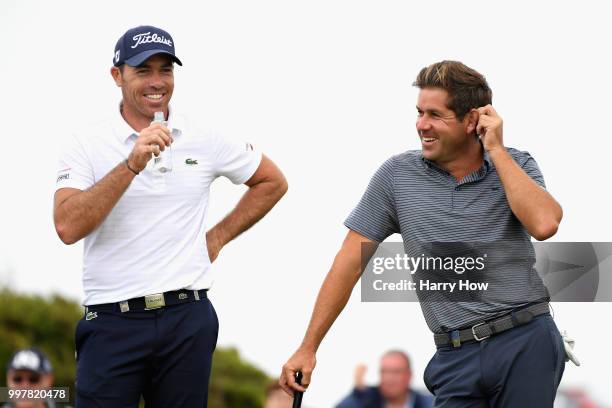 Robert Rock of England and Julien Guerrier of France laugh on the green of the sixteenth hole the during day two of the Aberdeen Standard Investments...