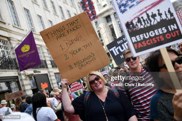 Protesters take part in a demonstration against President Trump's visit to the UK on July 13, 2018 in London, England. Tens of Thousands Of...