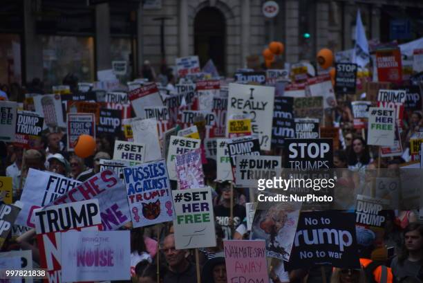 Protest takes place in Central London, against the US President Donald Trumps visit to the UK, including a giant inflatable Baby Trump, London on...