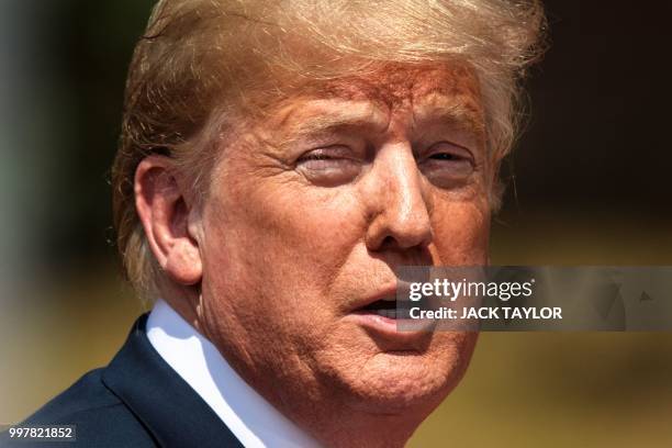 President Donald Trump speaks during a press conference with Britain's Prime Minister Theresa May following their meeting at Chequers, the prime...