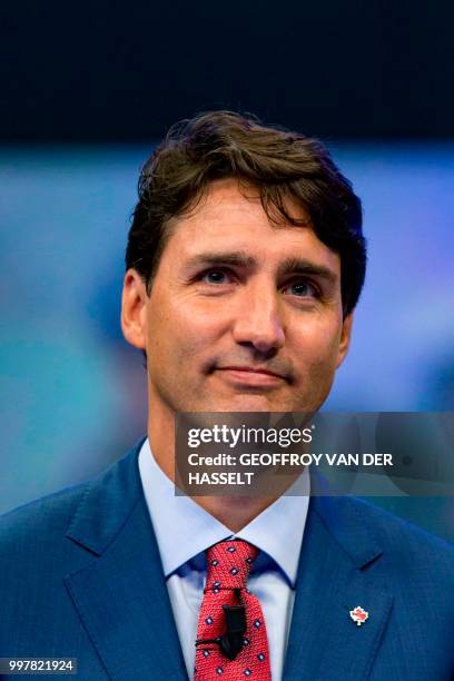 Canada's Prime Minister Justin Trudeau addresses the 'NATO Engages: The Brussels Summit Dialogue' event ahead of the NATO summit, at the NATO...