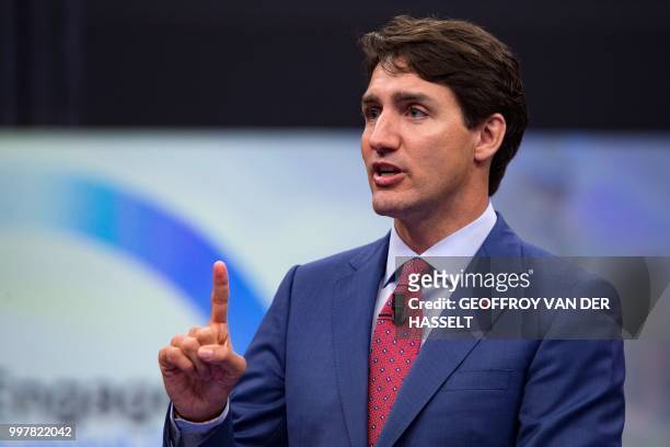 Canada's Prime Minister Justin Trudeau addresses the 'NATO Engages: The Brussels Summit Dialogue' event ahead of the NATO summit, at the NATO...
