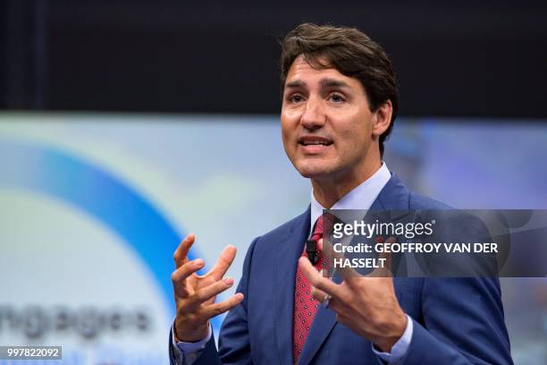 Canada's Prime Minister Justin Trudeau addresses the 'NATO Engages: The Brussels Summit Dialogue' event ahead of the NATO summit, at the NATO...