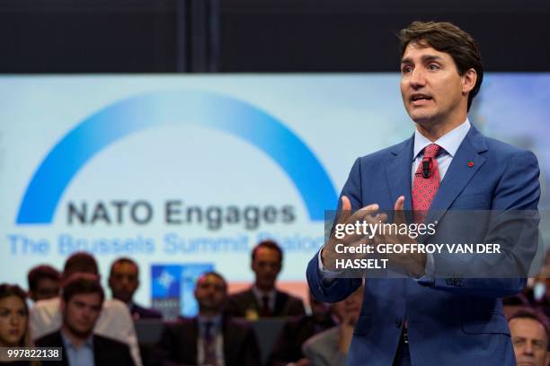 Canada's Prime Minister Justin Trudeau addresses the 'NATO Engages: The Brussels Summit Dialogue' event ahead of the NATO summit, at the NATO...