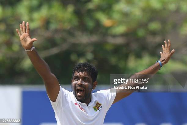 Sri Lankan cricketer Dilruwan Perera appeals during the 2nd day's play in the first Test cricket match between Sri Lanka and South Africa at Galle...