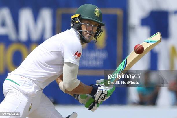 South African captain Faf Du Plessis plays a shot during the 2nd day's play in the first Test cricket match between Sri Lanka and South Africa at...