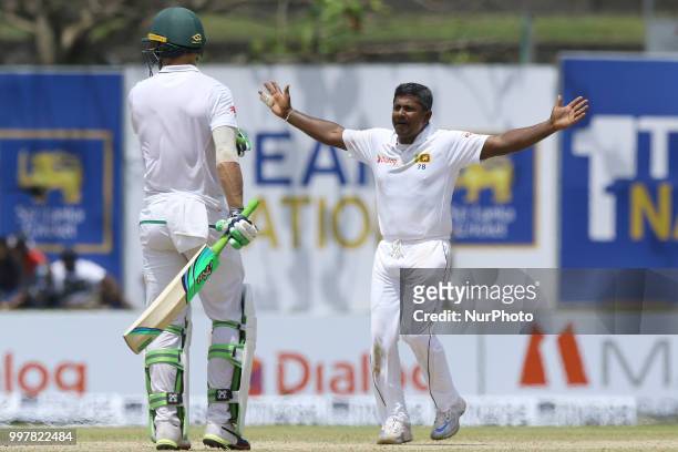 Sri Lankan cricketer Rangana Herath appeals for a wicket during the 2nd day's play in the first Test cricket match between Sri Lanka and South Africa...