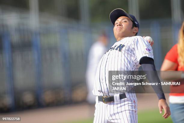 Hiromi Ito of Japan throws a ball into the audience when being elected player of the match after the Haarlem Baseball Week match between Japan and...