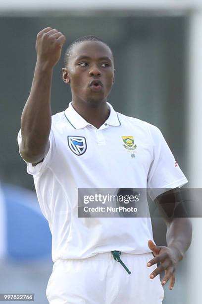 South African cricketer Kagiso Rabada celebrates after taking a wicket during the 2nd day's play in the first Test cricket match between Sri Lanka...