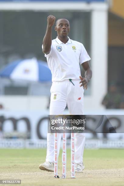 South African cricketer Kagiso Rabada celebrates after taking a wicket during the 2nd day's play in the first Test cricket match between Sri Lanka...
