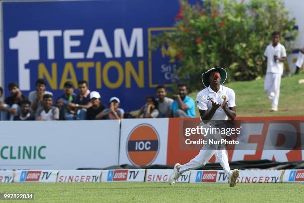 South African cricketer Kagiso Rabada completes a catch during the 2nd day's play in the first Test cricket match between Sri Lanka and South Africa...