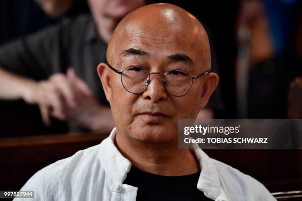 Exiled Chinese writer Liao Yiwu attends a commemoration for late Chinese dissident and Nobel Peace Prize laureate Liu Xiaobo in Berlin on July 13,...