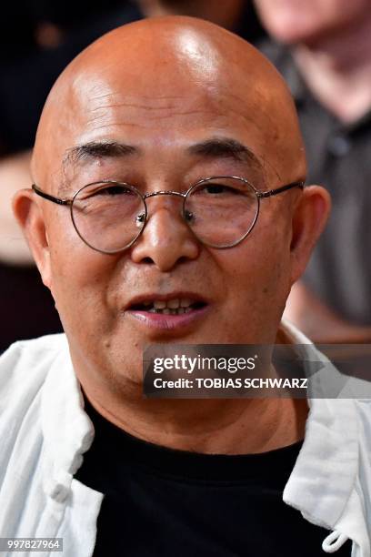 Exiled Chinese writer Liao Yiwu attends a commemoration for late Chinese dissident and Nobel Peace Prize laureate Liu Xiaobo in Berlin on July 13,...