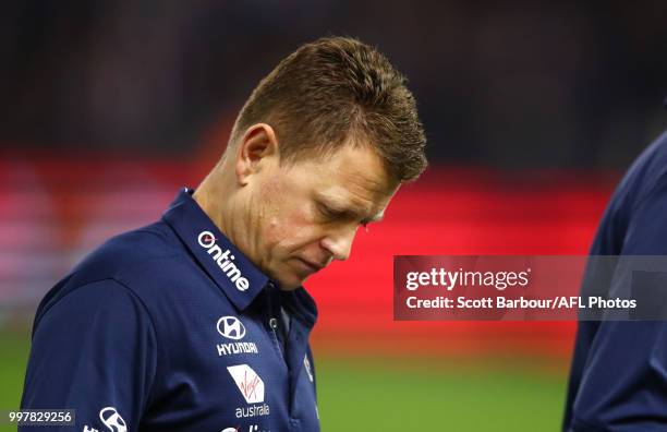 Blues head coach Brendon Bolton speaks to his team during a quarter time break during the round 17 AFL match between the St Kilda Saints and the...