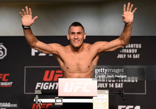 Niko Price poses on the scale during the UFC Fight Night weigh-in at The Grove Hotel on July 13, 2018 in Boise, Idaho.